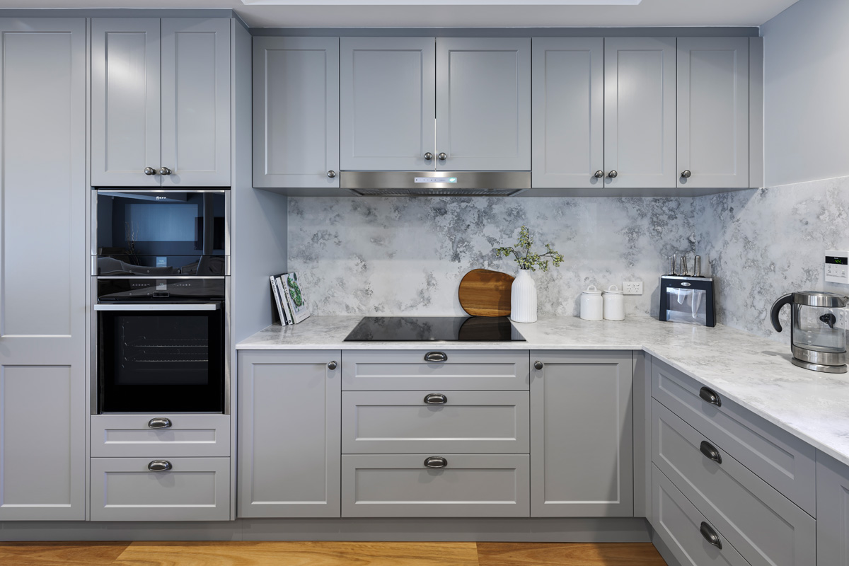 renovated kitchen, new flooring and layout with built-in appliances, stone sops and splashback, contemporary and luxurious.
