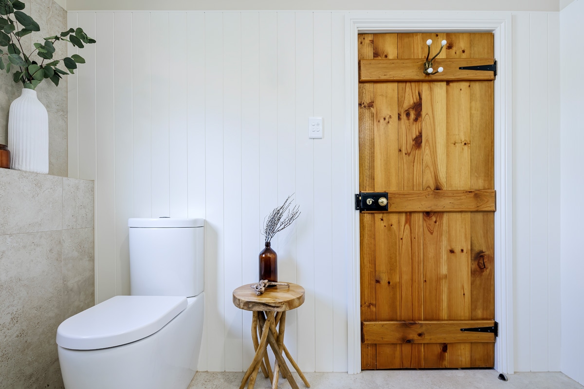 Timber door served as inspiration for this bathroom renovation