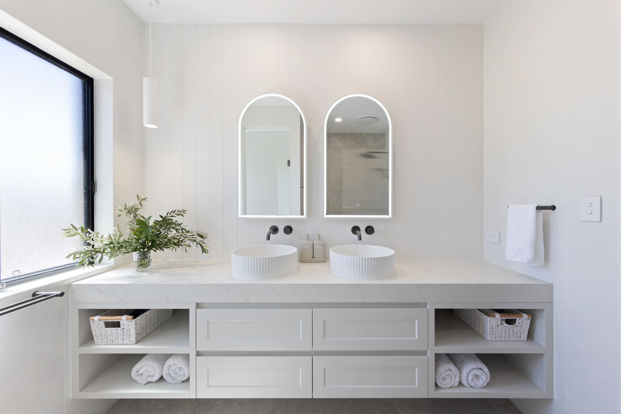 Modern Hamptons Style Ensuite with Dektop Benchtop, V-Jay Panelling, Custom Cabinetry in Polytec Casino Profiles, Twin Fluted Basins, LED Mirror Cabinets and Fucile Accessories