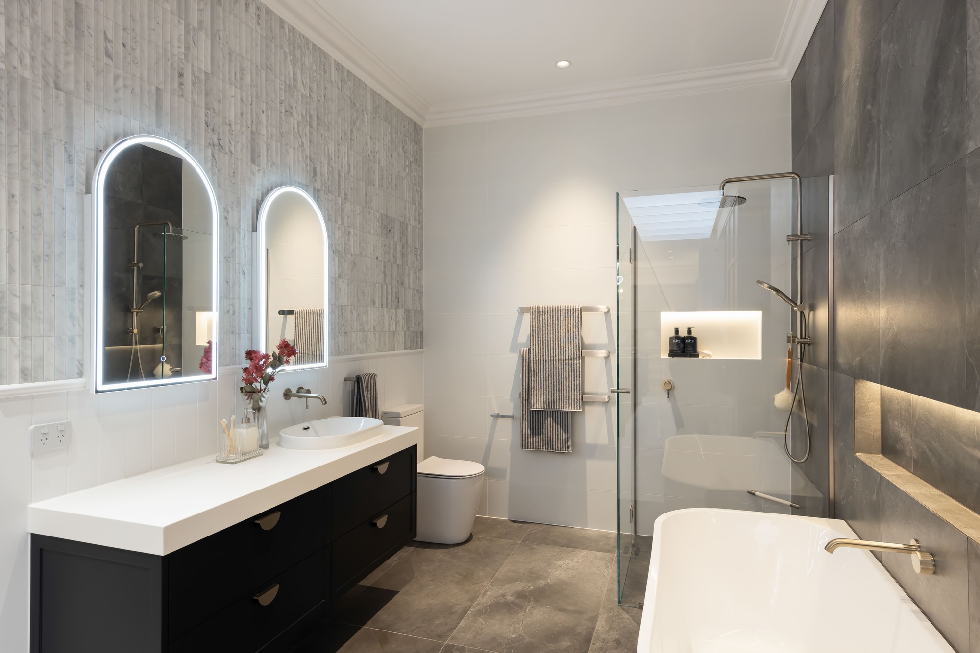 Hamptons Style Bathroom with V-Jay Panelling Wainscoting and Carrara Marble Decorative Tiles, LED Mirror Cabinets and Polytec Ascot Profiles in Dulux Maximus