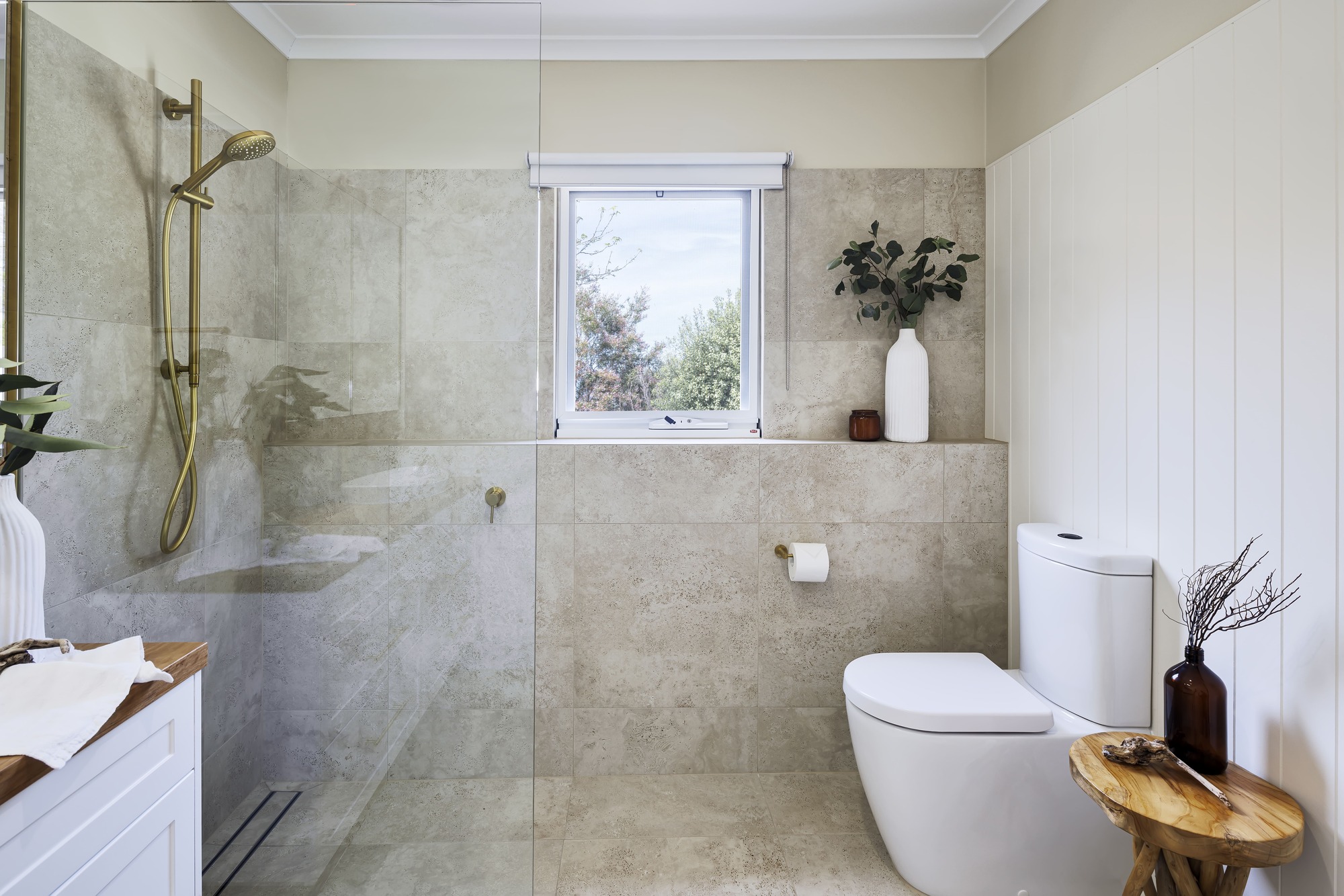 Coastal Hamptons Style Ensuite with V-Jay Panelling, V-Jay Panelling, Navona Honey Tiles, Walk-In Shower and Brushed Gold Accessories.
