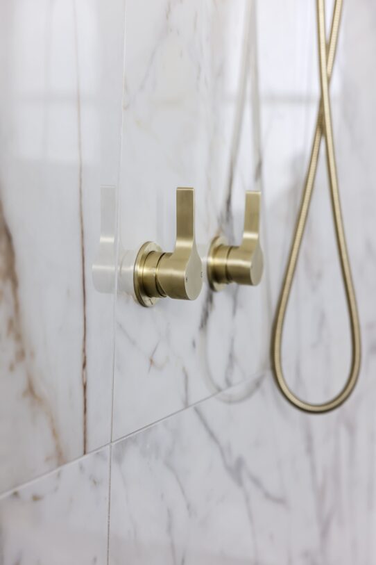 Brilliant SA Renovations -Luxurious brushed platinum gold on the tapware and fixtures