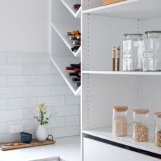 Contemporary white walk-in pantry renovation