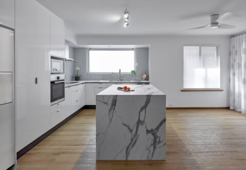 renovated kitchen, laminated benchtops, glass splashback, stainless steel and brushed chrome details, Bosch appliances