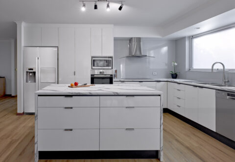 renovated kitchen, laminated benchtops, glass splashback, stainless steel and brushed chrome details, Bosch appliances
