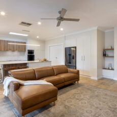 renovated kitchen and living areas, featured fireplace, open plan with new flooring, bespoke joinery, skylight and new appliances.