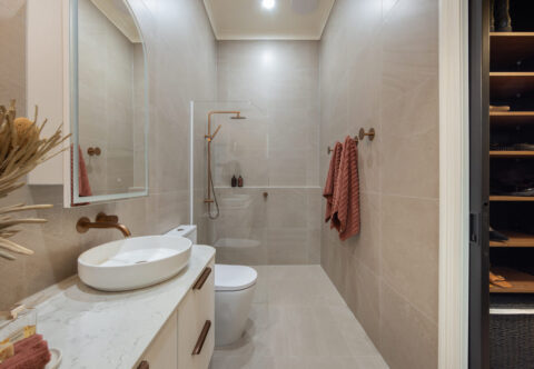 renovated ensuite, tiled from floor to ceiling, walk-in shower with glass divider, dual shower head and underfloor heating