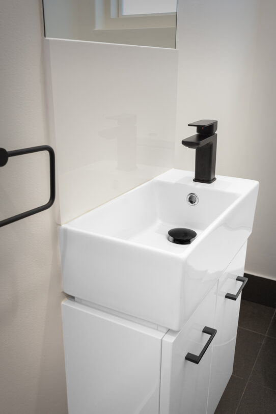 renovated WC with compact basin.