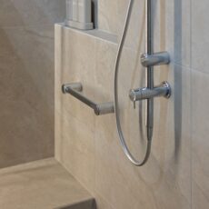 Renovated bathroom in Glenelg, with a shower bench seat, grab rails and shower niche, perfect for aging in place.